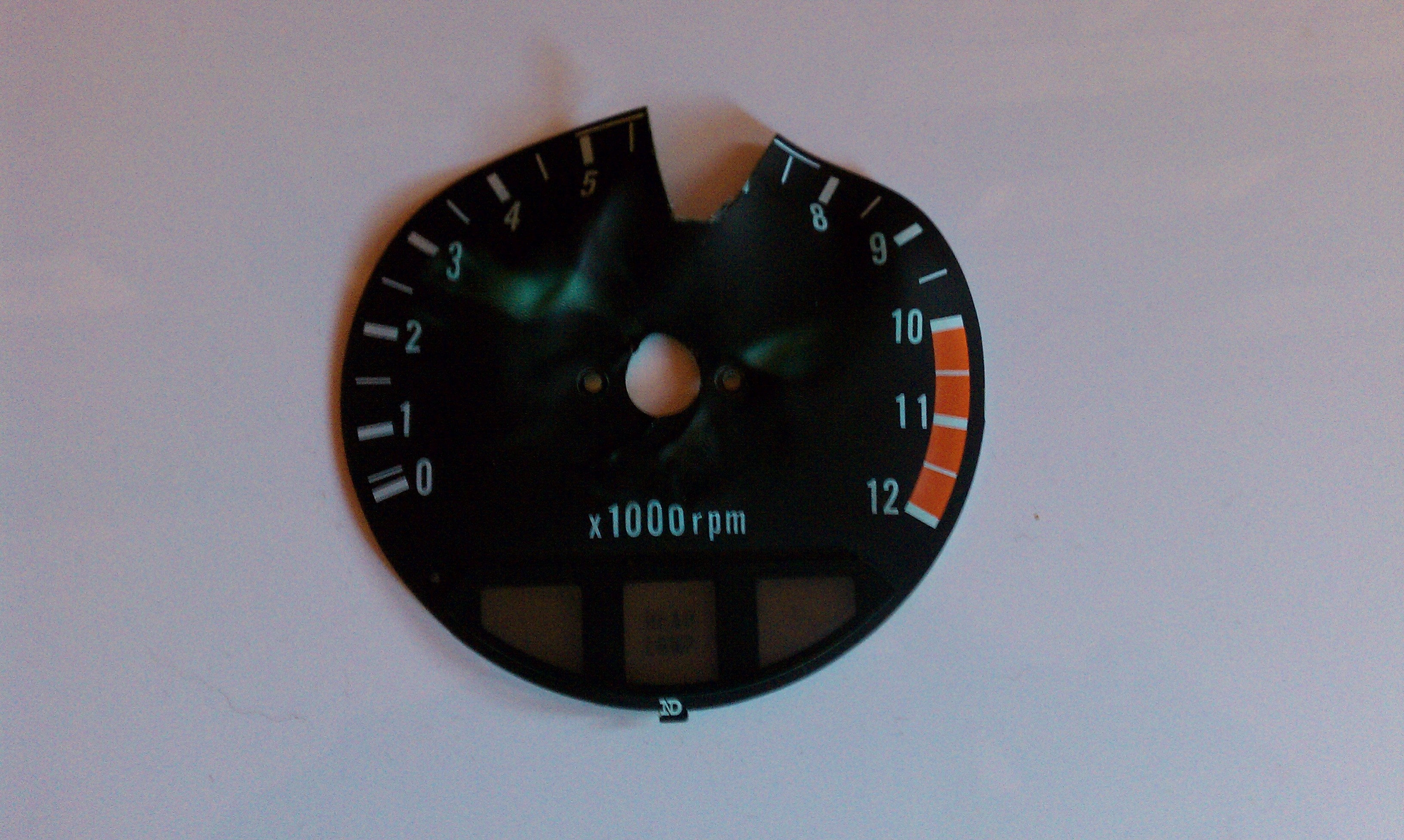 Warped Tachometer Guage