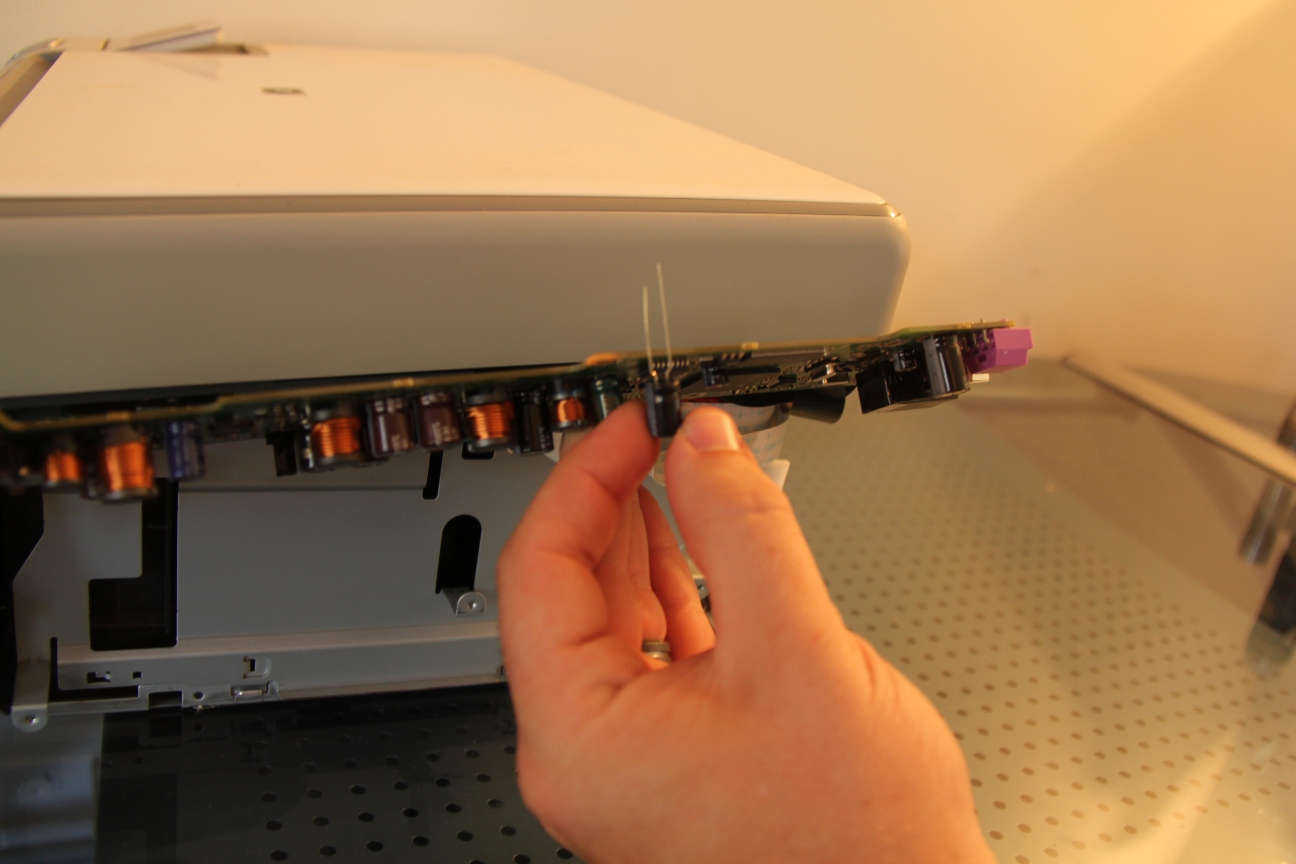Before removing the capacitor