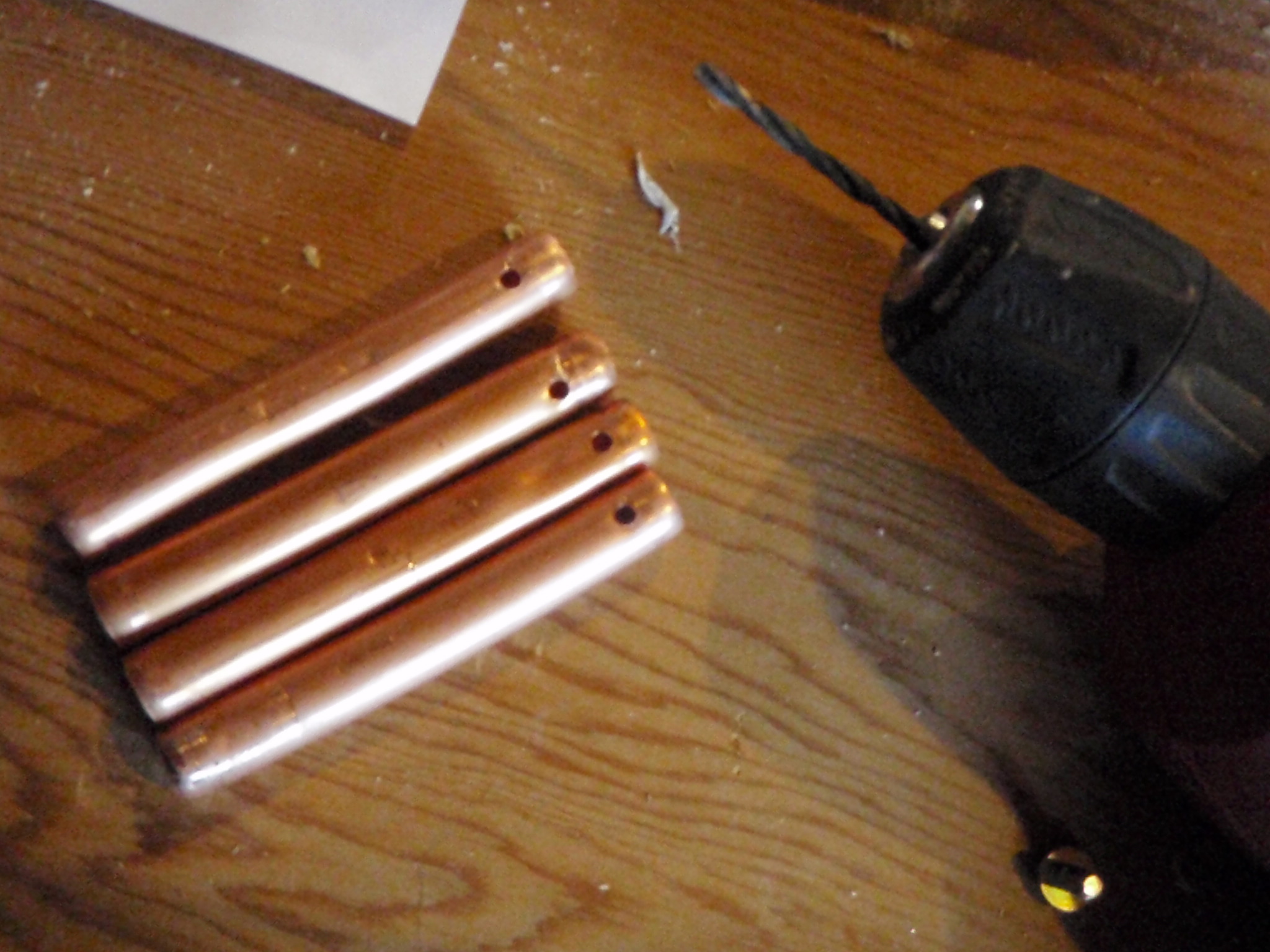 OLYMPUS DIGITAL CAMERA Drilled holes in copper tubing